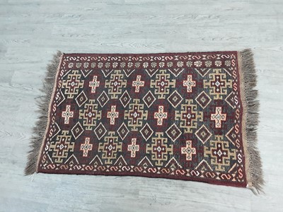 Lot 293 - A SMALL KILIM RUG