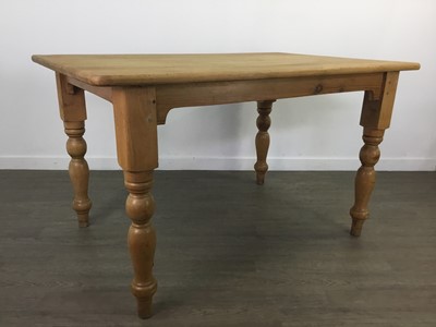 Lot 217 - A PINE FARMHOUSE DINING TABLE