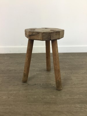 Lot 221 - AN OCTANGONAL OAK STOOL