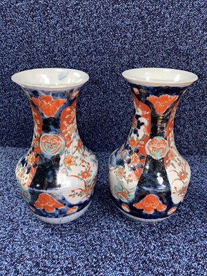 Lot 1083 - A PAIR OF LATE 19TH/20TH CENTURY JAPANESE IMARI BALUSTER VASES