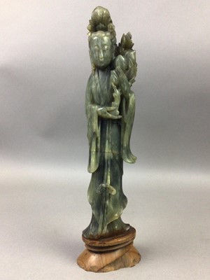 Lot 416 - A CHINESE HARDSTONE CARVING OF A LADY AND BUFFALO