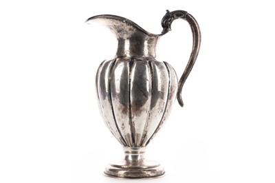 Lot 68 - A MEXICAN STERLING SILVER EWER