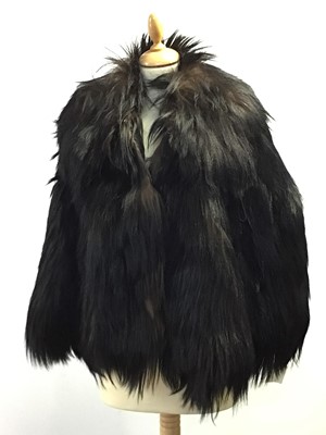 Lot 423 - A BEAR FUR CAPE, ALONG WITH OTHER FURS