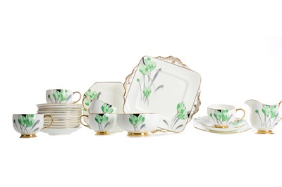 Lot 332 - AN ART DECO TWELVE SETTING PART TEA SERVICE BY PARAGON