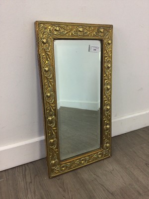 Lot 584 - A BRASS WALL MIRROR, TABLE LAMPS AND A WALL PLAQUE