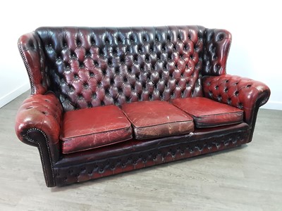 Lot 319 - A CHESTERFIELD-STYLE OXBLOOD THREE-PIECE SUITE