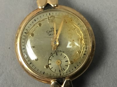 Lot 196 - A LADY'S SMITHS GOLD BRACELET WATCH