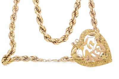 Lot 402 - A GOLD CHINESE PENDANT AND A ROPETWIST CHAIN