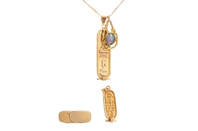 Lot 410 - AN OPAL DOUBLET PENDANT ALONG WITH TWO EGYPTIAN THEMED PENDANTS AND A GOLD CUFFLINK