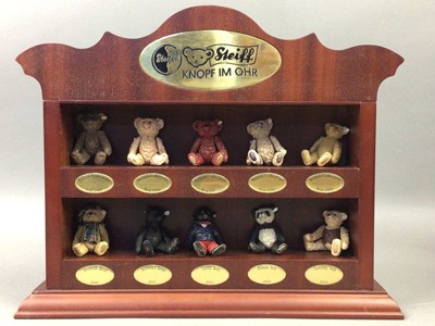 Lot 402A - A GROUP OF MINIATURE STEIFF BEAR FIGURES AND A DISPLAY RACK