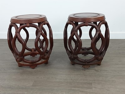 Lot 288 - A PAIR OF CHINESE OPEN BARREL SHAPED VERANDAH SEATS