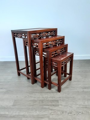 Lot 292 - A NEST OF FOUR CHINESE HARDWOOD OCCASIONAL TABLES