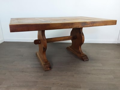Lot 194 - A SOLID PINE REFECTORY STYLE DINING TABLE AND FOUR CHAIRS