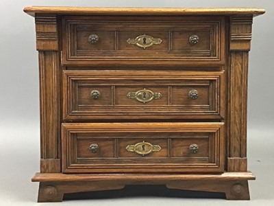 Lot 388 - A MINIATURE OAK THREE DRAWER CHEST