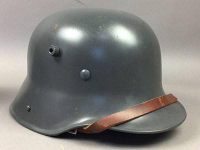 Lot 323 - A REPRODUCTION M16 STAHLHELM AND TWO CAPS