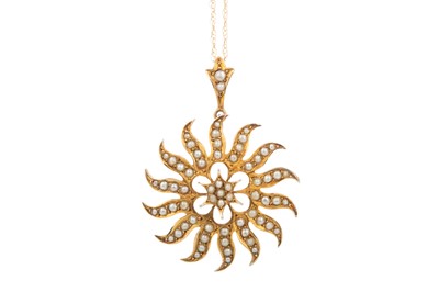 Lot 435 - A SEED PEARL SUNBURST PENDANT