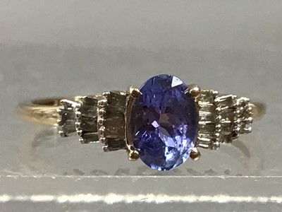 Lot 396 - A TANZANITE AND DIAMOND RING