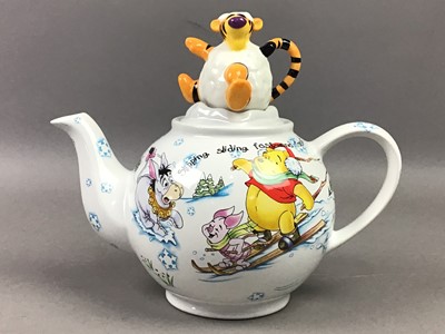 Lot 406 - A GROUP OF TEAPOTS AND WALL PLATES