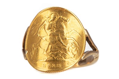 Lot 443 - A GOLD HALF SOVEREIGN RING