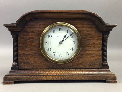 Lot 356 - AN EARLY 20TH CENTURY OAK MANTEL CLOCK AND A VICTORIAN CUT GLASS OIL LAMP