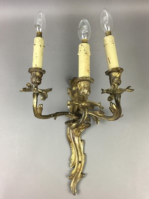 Lot 885 - A PAIR OF GILT METAL WALL SCONCES OF ROCOCO DESIGN