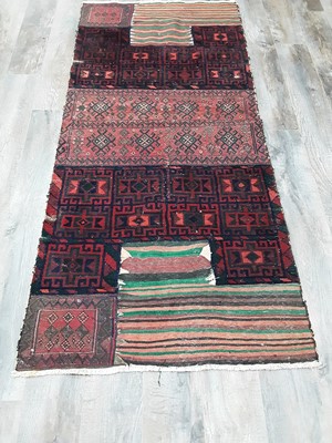 Lot 435 - THREE MIDDLE EASTERN RUGS