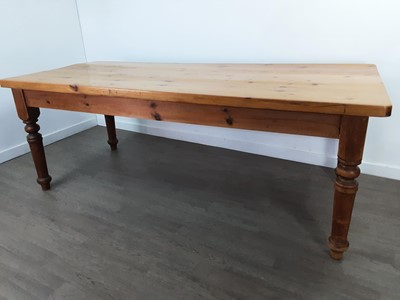 Lot 425 - A LARGE PINE FARMHOUSE DINING TABLE