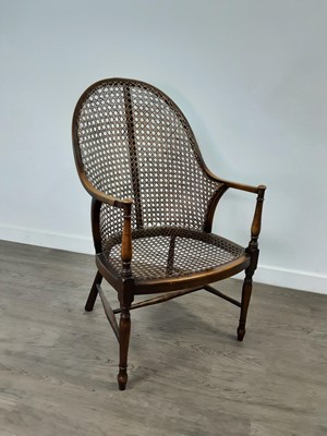 Lot 432 - A BERGERE ARMCHAIR