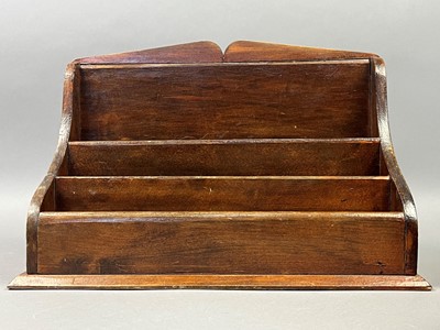 Lot 440 - A MAHOGANY LETTER RACK AND TWO BOOK TROUGHS