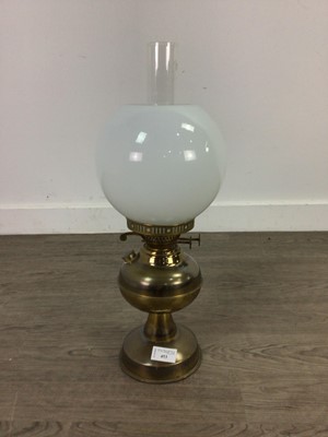 Lot 453 - A BRASS OIL LAMP