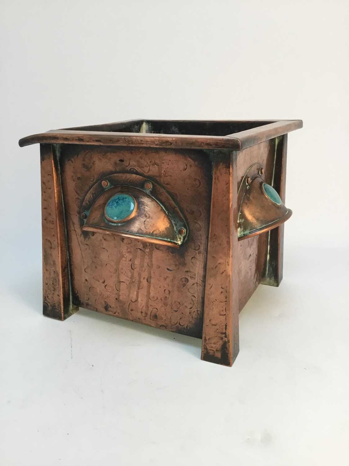 Lot 88 - AN ARTS & CRAFTS HAMMERED COPPER PLANTER