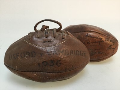 Lot 90 - TWO EARLY 20TH CENTURY OXFORD VS CAMBRIDGE SOUVENIR RUGBY BALLS