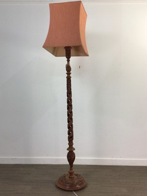 Lot 58 - AN EASTERN CARVED WOOD STANDARD LAMP AND ANOTHER