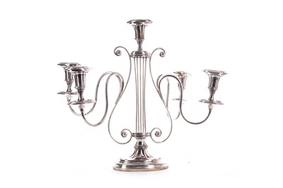 Lot 111 - A 19TH CENTURY OLD SHEFFIELD PLATE FOUR-BRANCH CANDELABRUM