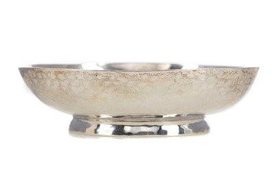 Lot 126 - AN EDWARDIAN HAMMERED SILVER PIN DISH