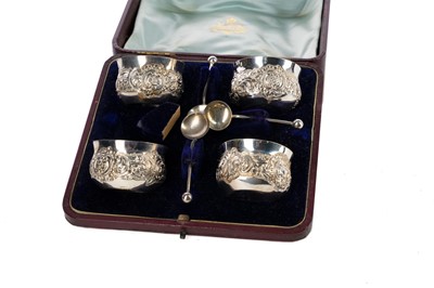 Lot 128 - A SET OF FOUR VICTORIAN SILVER SALT CELLARS AND A PAIR OF DISHES