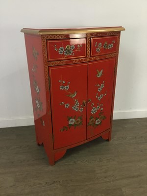 Lot 10 - A CHINESE RED LACQUERED BOW FRONT CABINET