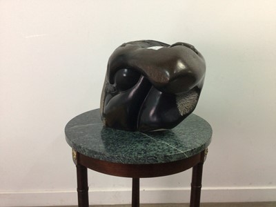 Lot 64 - SWORN TO SILENCE, A STONE SCULPTURE BY RONNIE DONGO