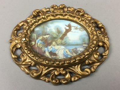 Lot 234 - A PAIR OF OVAL MINIATURE PAINTINGS ON CARD