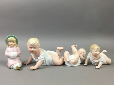 Lot 230 - A GROUP OF GERMAN BISQUE 'PIANO' BABIES AND TWO CHERUB FIGURES