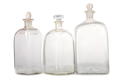 Lot 727 - THREE GEORGIAN CLEAR GLASS DECANTERS