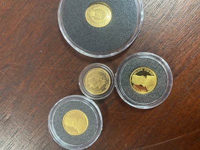 Lot 71 - FOUR MINIATURE GOLD COINS