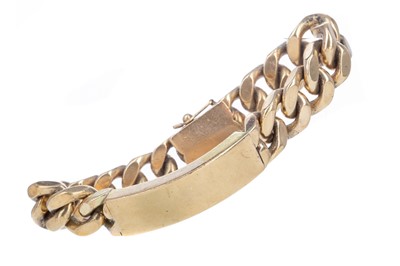 Lot 503 - A NINE CARAT GOLD ID BRACELET