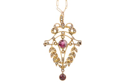 Lot 509 - A PURPLE GEM SET AND SEED PEARL HOLBEIN