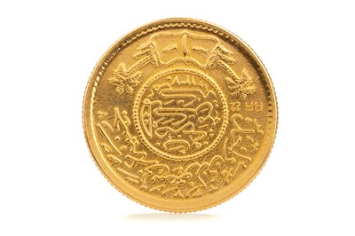 Lot 73 - A SAUDI ARABIAN ONE GUINEA COIN