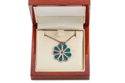 Lot 380 - NORMAN GRANT (SCOTTISH, BORN 1943), A SILVER AND ENAMELLED FLORAL PENDANT