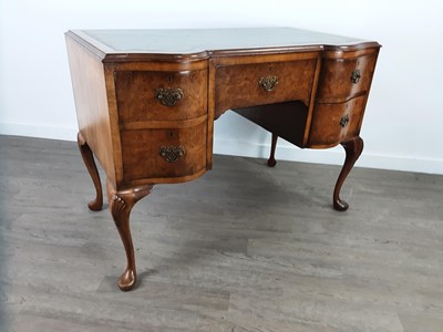 Lot 292 - A WALNUT WRITING DESK WITH GREEN LEATHER SKIVER
