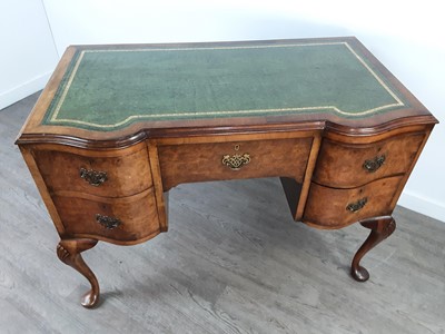 Lot 292 - A WALNUT WRITING DESK WITH GREEN LEATHER SKIVER