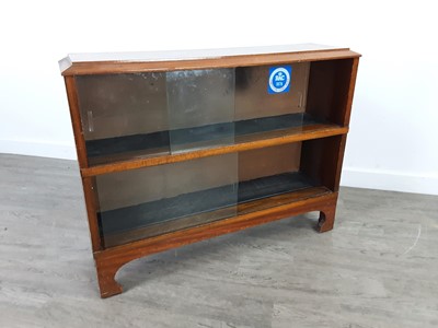Lot 295 - A TWO DOOR BOOKCASE