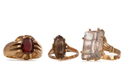 Lot 552 - THREE GEM SET RINGS